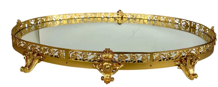 A LARGE ORMOLU PLATEAU