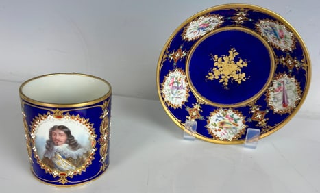 A MAGNIFICENT JEWELLED SEVRES CUP AND SAUCER
