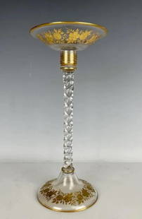 LARGE MOSER CANDLE HOLDER: Circa 1900. Large Moser Gilded Intaglio Candle holder/ Bohemian Twist Stem Candle Centrepiece. Measures 12.5 inches tall. In Good condition. Estimate $500-600
