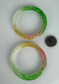 A PAIR OF CHINESE JADITE BRACELETS