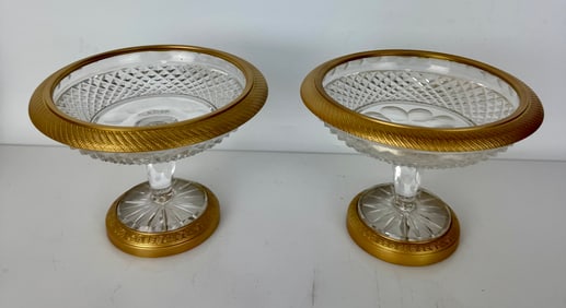 A PAIR OF ORMOLU MOUNTED AND BACCARAT STYLE CRYSTAL TAZZAS