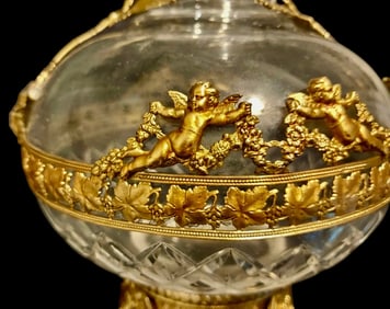 A FINE ORMOLU MOUNTED BACCARAT CRYSTAL VASE
