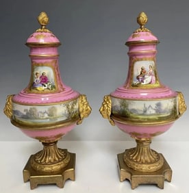 A PAIR OF ORMOLU MOUNTED SEVRES VASES