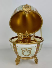 A VERY LARGE IMPERIAL FABERGE LIMOGE PORCELAIN MUSICAL EGG