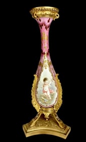 A LARGE SEVRES PORCELAIN AND CHAMPLEVE ENAMEL VASES