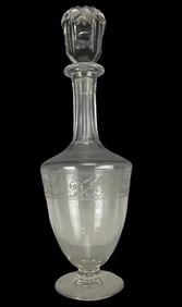 A SIGNED BACCARAT ETCHED CRYSTAL LIQUOR BOTTLE