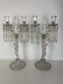 A PAIR OF BACCARAT ENFANT CANDELABRA