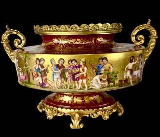 A LARGE ORMOLU MOUNTED ROYAL VIENNA PORCELAIN CENTERPIECE