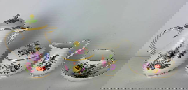 19TH C. MEISSEN TEA SET: Comprising of teapot, sugar, milk, and one cup and saucer. Minor restoration to milk jug.Estimate $600-800
