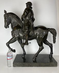 LARGE BRONZE SCULPTURE OF A SOLDIER ON HORSE
