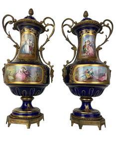A PAIR OF ORMOLU MOUNTED SEVRES PORCELAIN VASES AND COVERS: Circa 1900. Measure 17.5 inches Tall. No breaks, no chips. Estimate $2500-3000