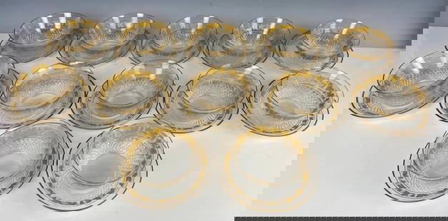 SET OF 12 GILT CRYSTAL FINGER BOWLS AND PLATES: Measure 5.7 inches d. All in excellent condition. Estimate $1200-1500