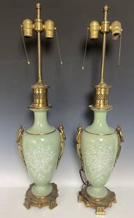 A PAIR OF PATE SUR PATE ORMOLU MOUNTED PORCELAIN VASES: Circa 1900. Porcelain vases measure 16.5 “ tall, over to top of fixture 31 inches tall. Good condition.Estimate $1.200-1.500