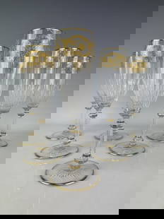 SET OF 6 SIGNED BACCARAT CUT CRYSTAL CHAMPAGNE COUPS: Measure 8.25 inches tall. All in excellent condition. All with acid etched Baccarat marks.Estimate $2.500-3.000