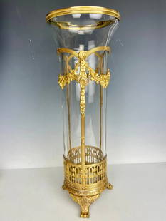A LARGE ORMOLU MOUNTED BACCARAT GLASS VASE: Circa 1900. Measures. 16 inches tall x 5-7/8 inches wide at top, 5-1/2 inches at bottom (including feet)..In excellent condition. Estimate $1000-1200