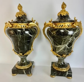 A PAIR OF ORMOLU MOUNTED VERDE MARBLE VASES AND COVERS