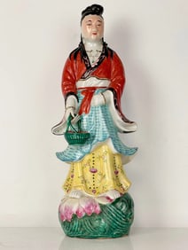CHINESE POLYCHROMED PORCELAIN STATUE