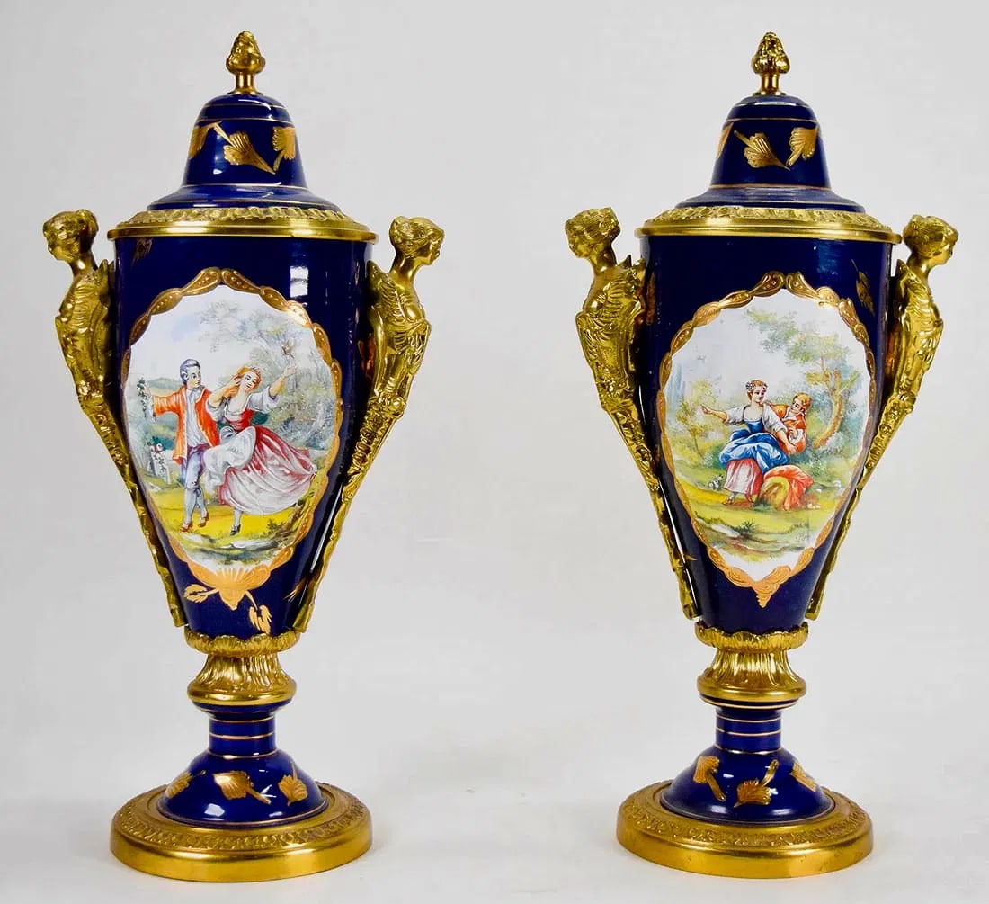 A PAIR OF SEVRES STYLE PORCELAIN VASES: Measure 19 inches tall. In excellent condition. Estimate $1000-1200