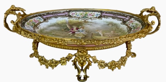 A LARGE ORMOLU MOUNTED SEVRES PORCELAIN CENTREPIECE