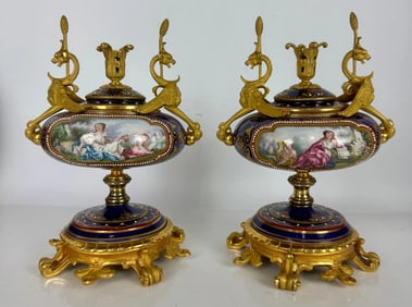 A FINE PAIR OF ORMOLU MOUNTED JEWELLED SEVRES GARNITURES