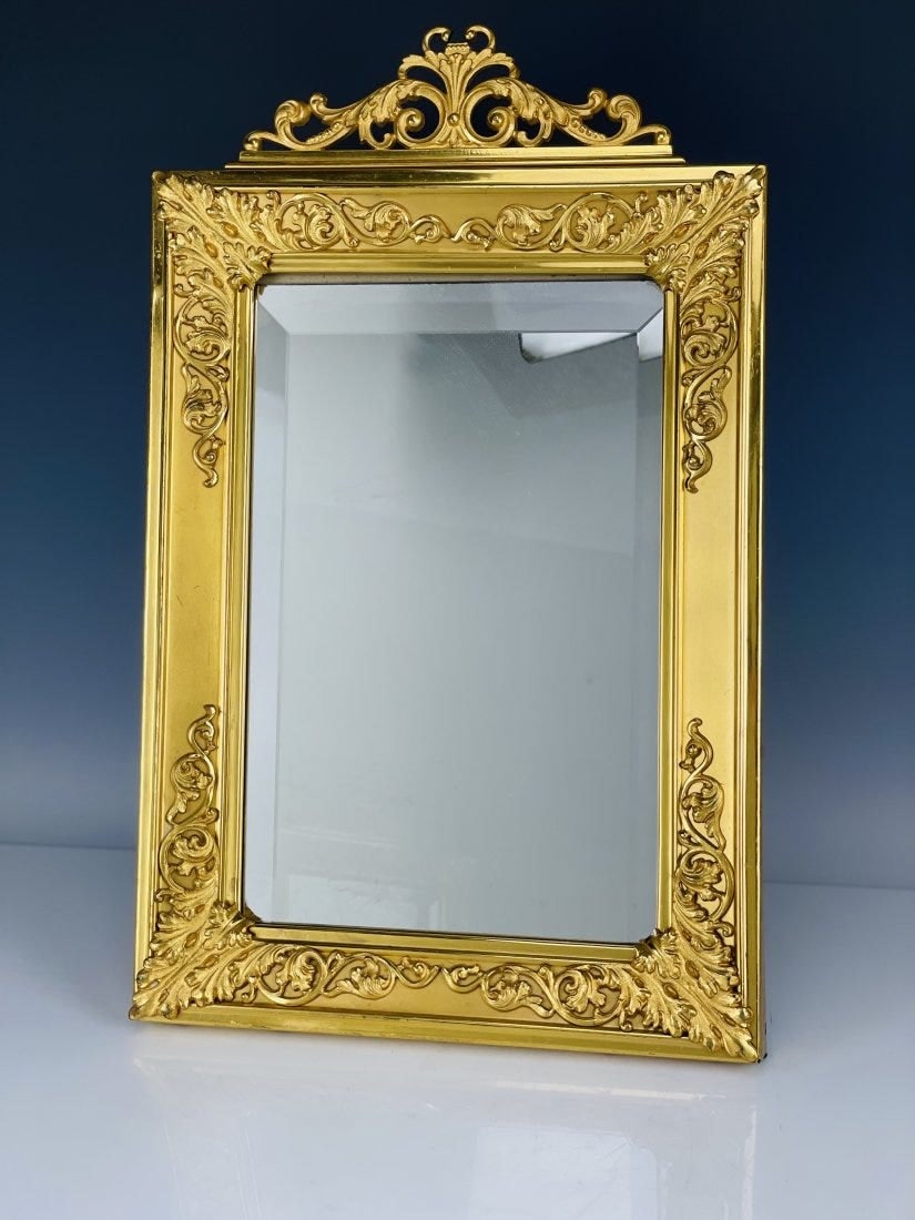A LARGE ORMOLU MIRROR (1 of 3)