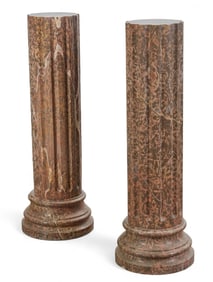A PAIR OF MABLE COLUMNS