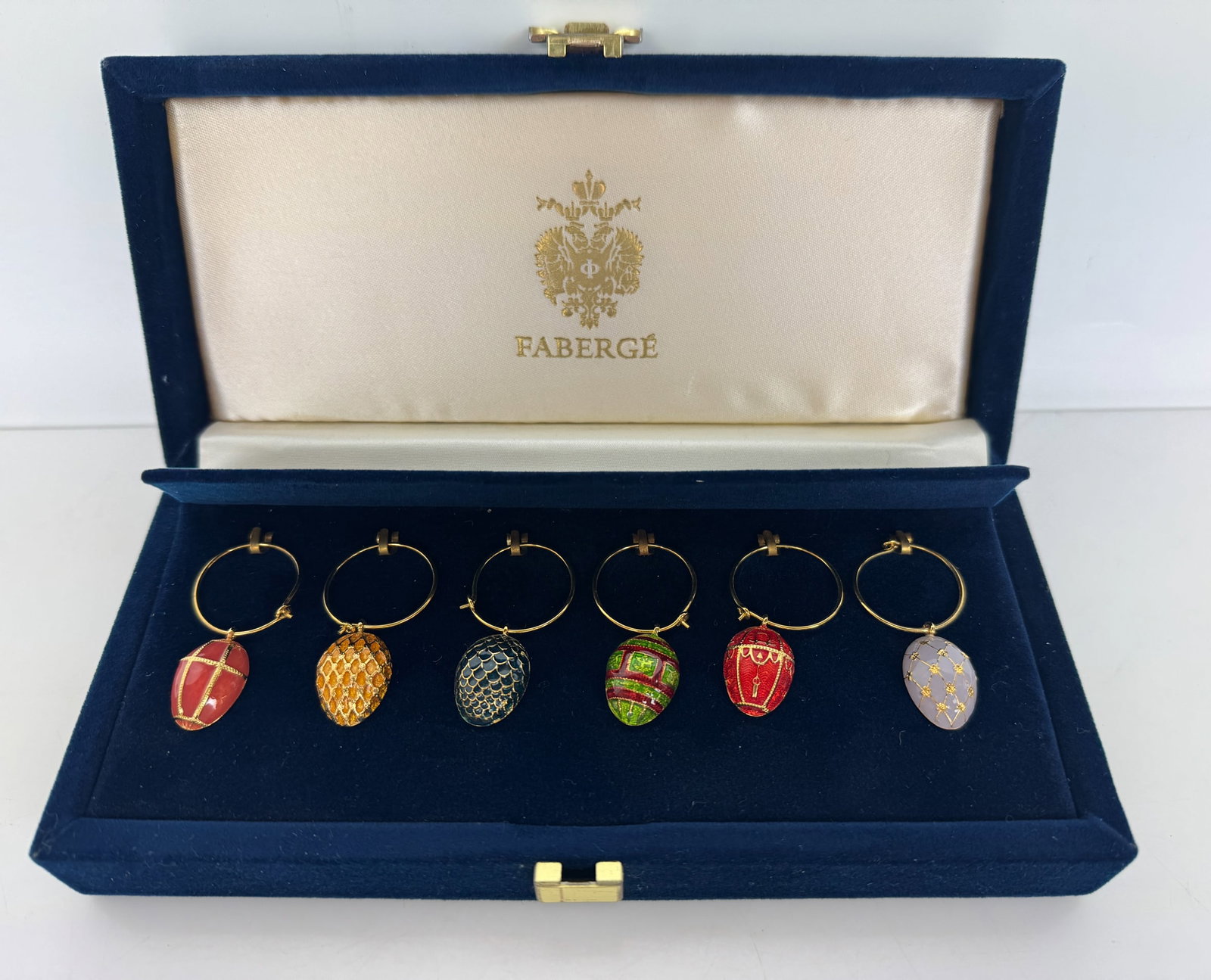 IMPERIAL FABERGE ENAMEL WINE MARKERS: Set of 6 to put on wine glasses to distinguish ownerships. In excellent condition. Estimate $600-800
