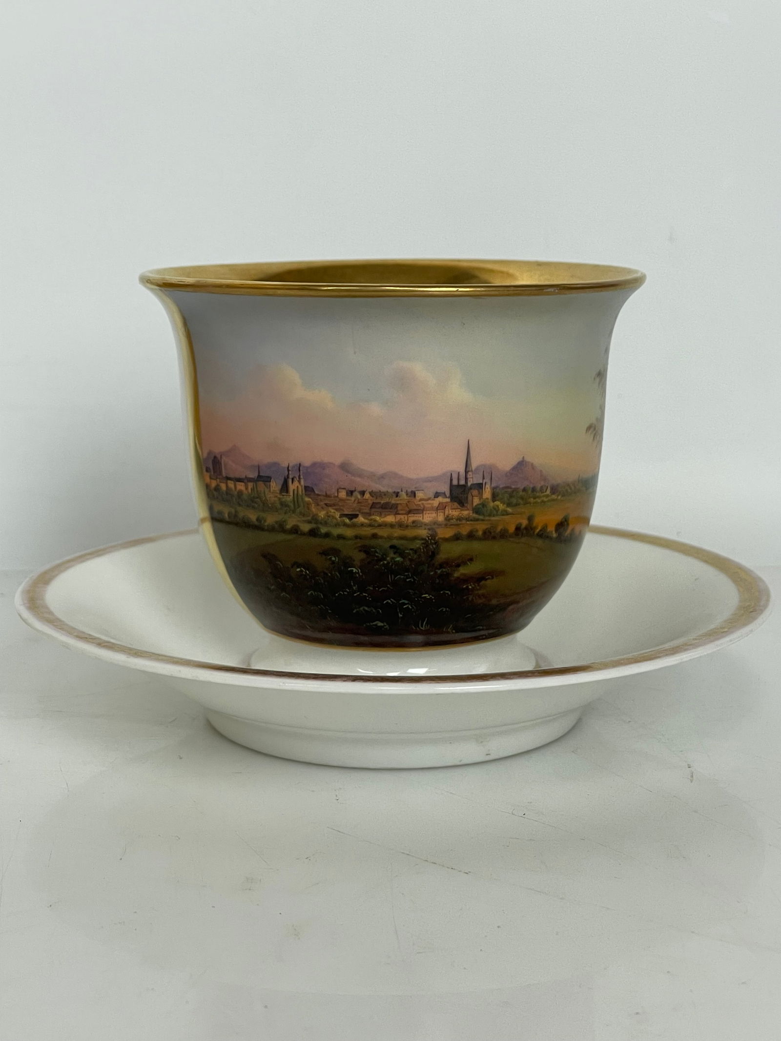 BERLIN KPM CUP AND SAUCER: Circa 1880. No breaks, no hairlines, no restoration. Estimate $600-800