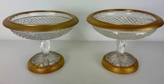 A PAIR OF ORMOLU MOUNTED BACCARAT CRYSTAL TAZZAS