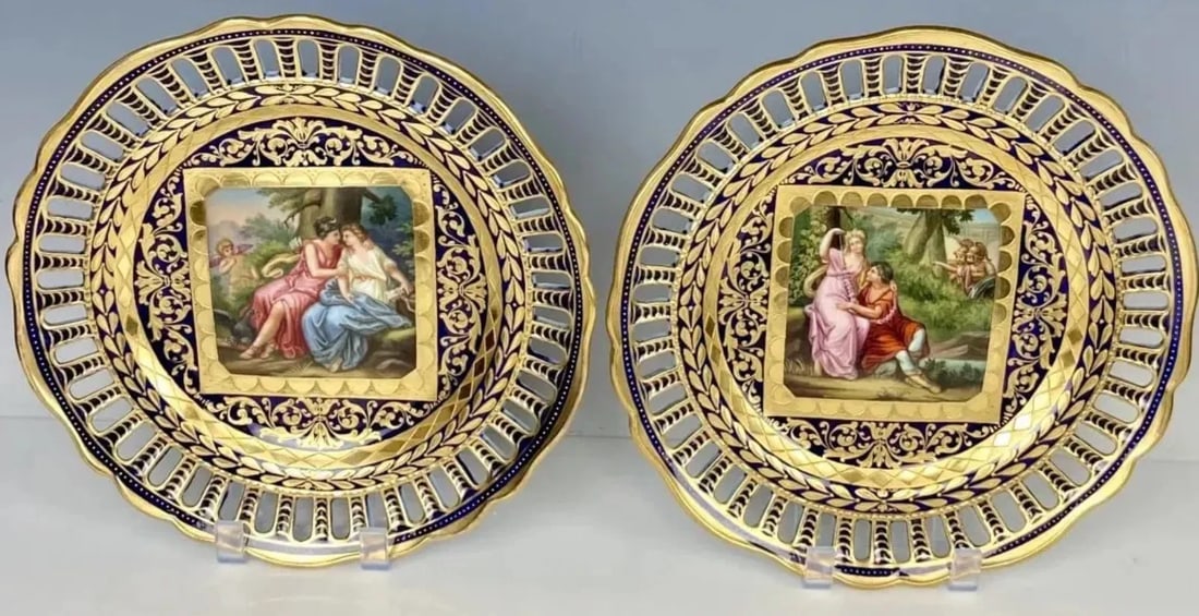 A PAIR OF 19TH C. ROYAL VIENNA RETICULATED PLATES: Measure 9.5 inches d. In good antique condition. Estimate $1.000-1.200