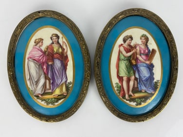 A PAIR OF SEVRES AND ORMOLU PLAQUES