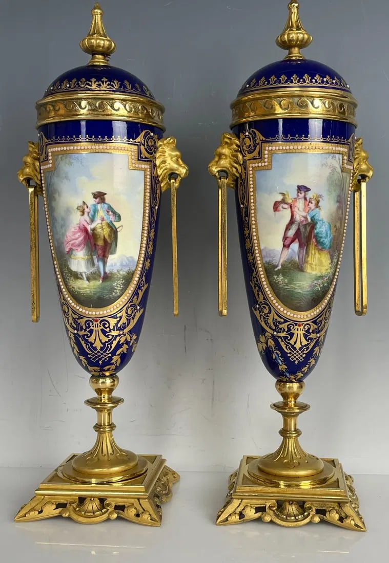 APAIR OF 19TH C. JEWELLED SEVRES VASES AND COVER: Measures 9.5 inches high. In perfect condition, one lid restored. Estimate $600-800