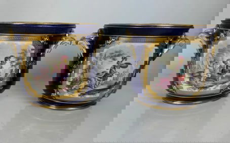 A PAIR OF JEWELED SEVRES FLOWER POTS