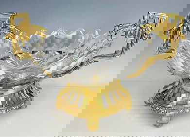 A LARGE ORMOLU AND CUT CRYSTAL CENTERPIECE