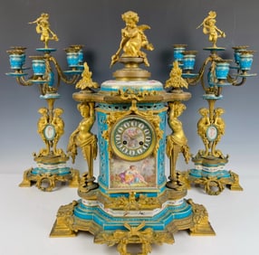 A MAGNIFICENT JEWELLED SEVRES & ORMOLU CLOCK SET