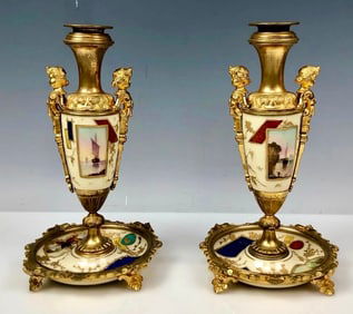 A PAIR OF ORMOLU MOUNTED PARIS PORCELAIN CANDEL HOLDERS