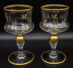 A PAIR OF GILT DAUM NANCY WINE GLASSES