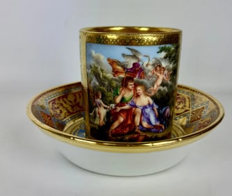 A LARGE ROYAL VIENNA CUP AND SAUCER