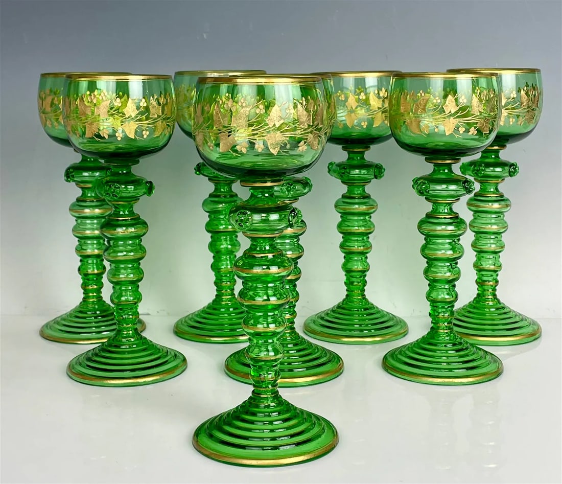 SET OF 8 GILT MOSER WINE GLASSES: Circa 1900. Measure 8 inches tall. All in good used condition. Estimate $1.000-1.500