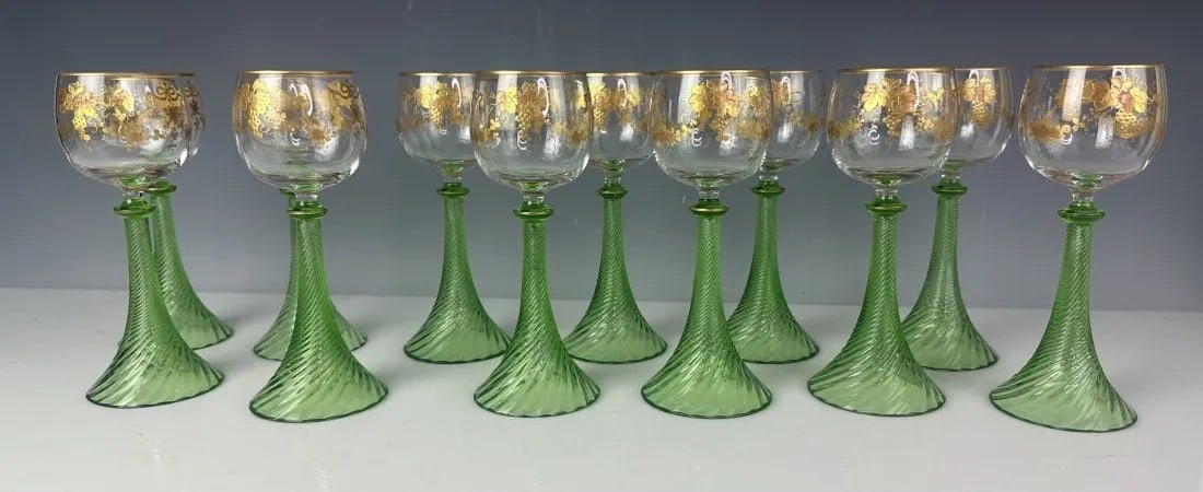 SET OF 9 ENAMELLED AND GILT MOSER WINE GLASSES: Circa 1900. Measure 7.7 inches tall. All in good condition. Estimate $1.500-2.000
