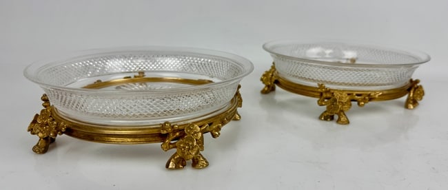 A PAIR OF ORMOLU MOUNTED BACCARAT CRYSTAL DISHES