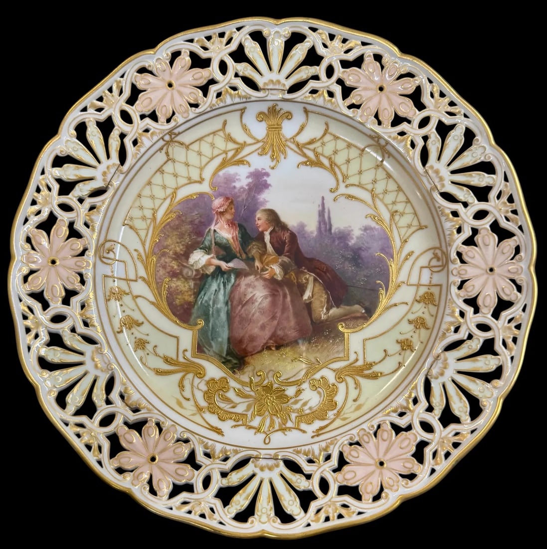 BERLIN KPM RETICULATED AND ENAMELLED PLATE: Circa 1900. Measures 9 inches d. In excellent condition. Estimate $1500-2000