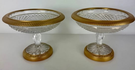 A PAIR OF ORMOLU MOUNTED BACCARAT CRYSTAL TAZZAS