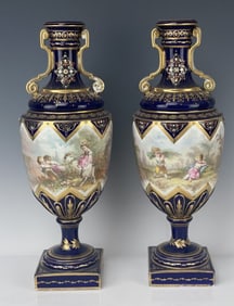 A PAIR OF JEWELED SEVRES PORCELAIN VASES