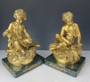 A PAIR OF DORE BRONZE SCULPTURES SIGNED R. MOREAU