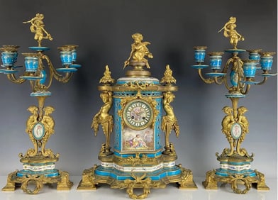 A MAGNIFICENT JEWELLED SEVRES & ORMOLU CLOCK SET