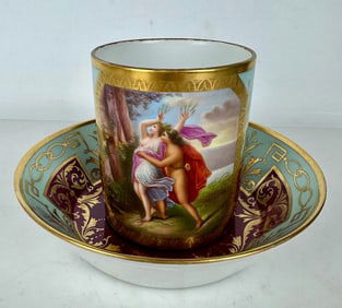 A LARGE ROYAL VENNA CUP AND SAUCER