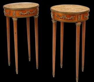 A PAIR OF LOUIS XVI STYLE DORE BRONZE MOUNTED MAHOGANY GUERDIONS
