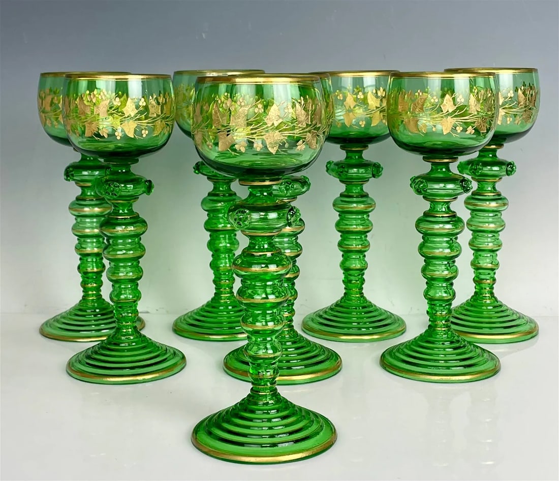 SET OF 8 GILT MOSER WINE GLASSES: Circa 1900. Measure 8 inches tall. All in good used condition. Estimate $1.000-1.500