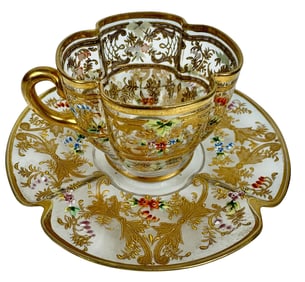 A FINE GILT AND ENAMELLED MOSER DEMITASSE CUP AND SAUCER